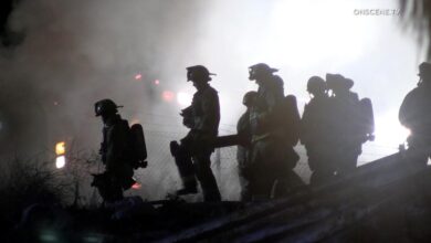 110 freeway closed in both directions in Wilmington for fire near encampment