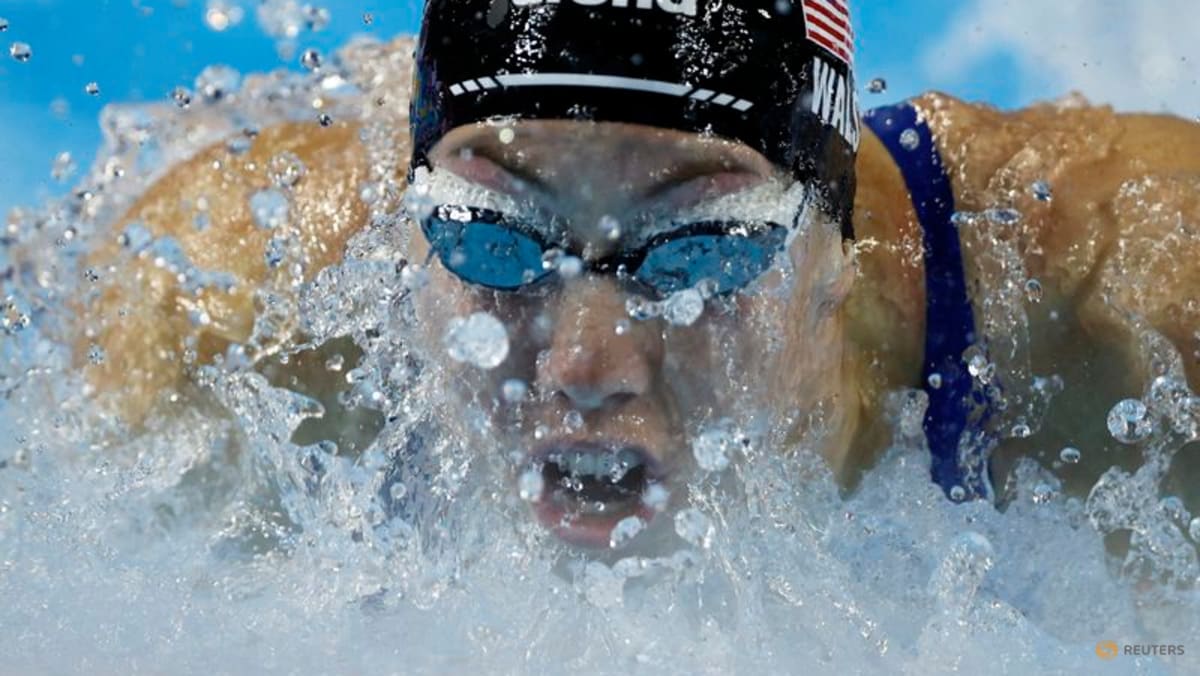 American Walsh improves own 100m butterfly world record for third time in a year