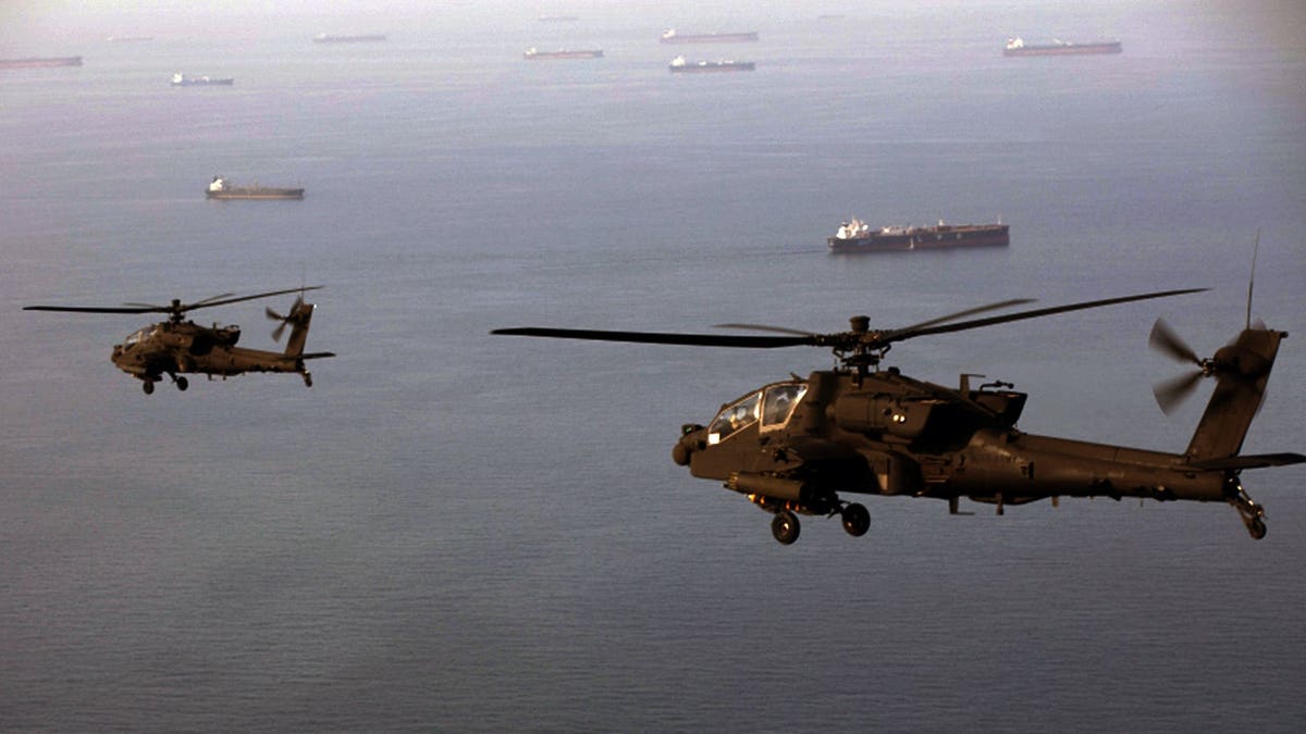 Cargo ship attacked by small craft near Strait of Hormuz, UK maritime agency says