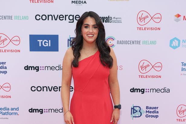 Colette Fitzpatrick looks radiant in red as she leads the style at glitzy event