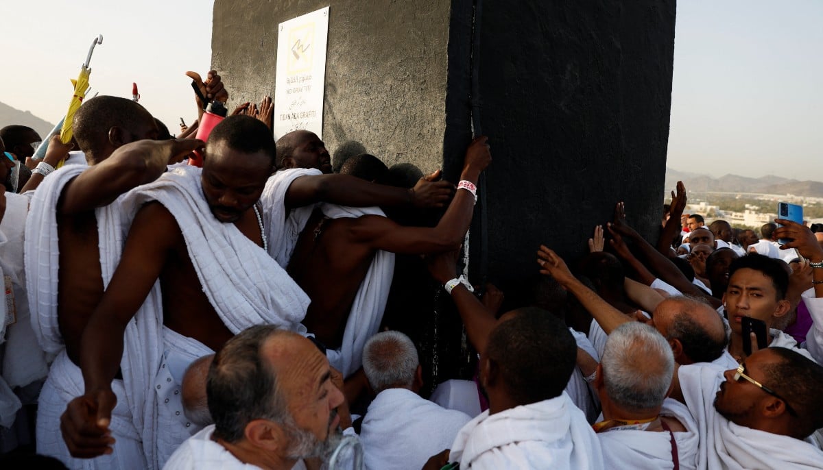 In pictures: Pilgrims pray on Mount Arafat as Hajj reaches peak