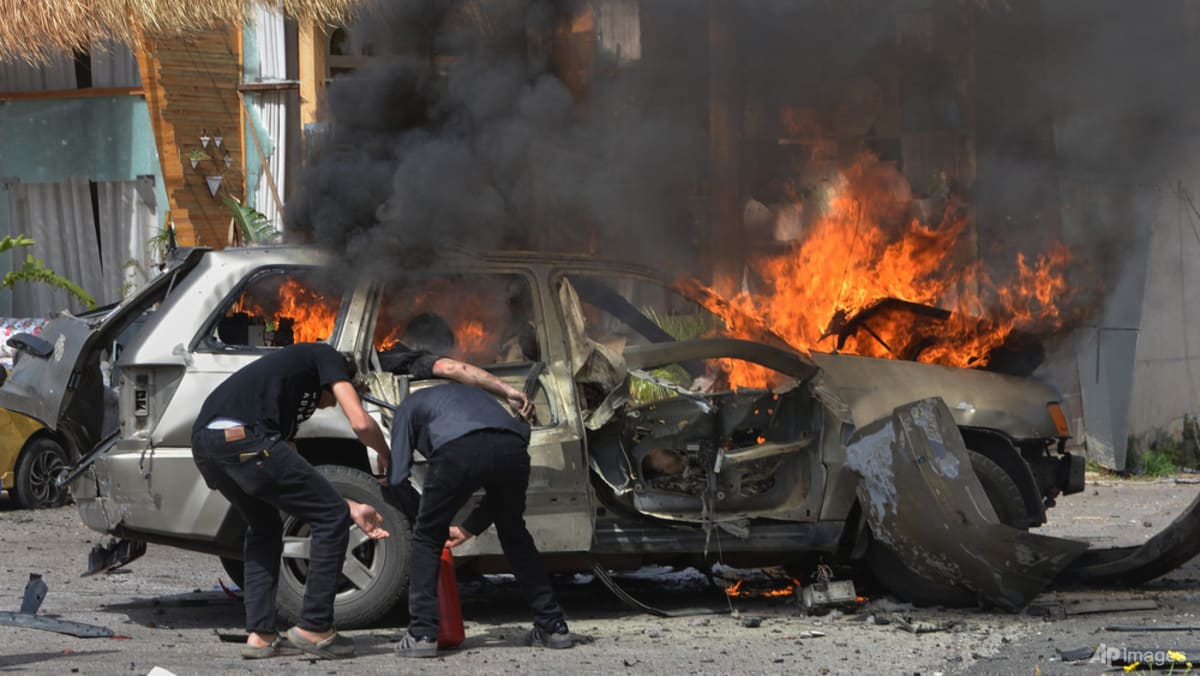 Israel hammers Lebanon, killing 12 in strikes on cars