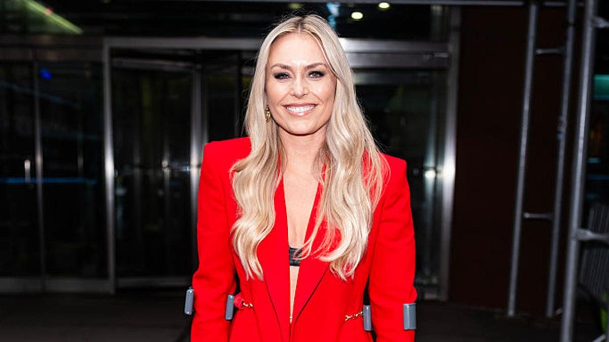 Lindsey Vonn ditches her undershirt in a fiery red pantsuit, Maggie Sajak is a force & coach attacks umpire!