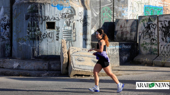 Marathon marks a turning point for a Palestinian runner released from an Israeli prison