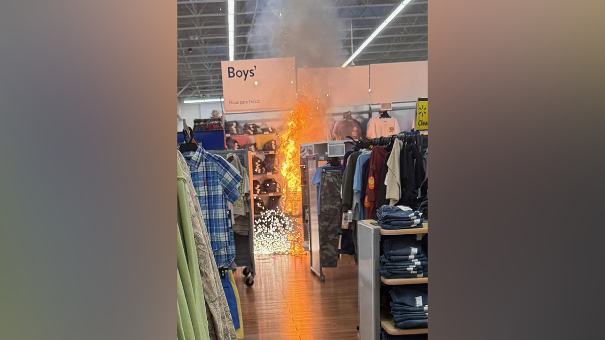 Masked suspect charged with using fuel, fireworks in Walmart kids section as cover for massive jewelry heist