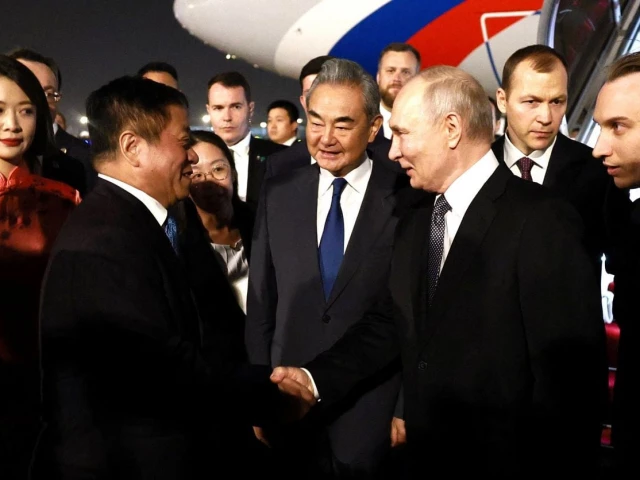 Putin lands in China for trip that aims to show unshakeable ties after Trump pomp | The Express Tribune