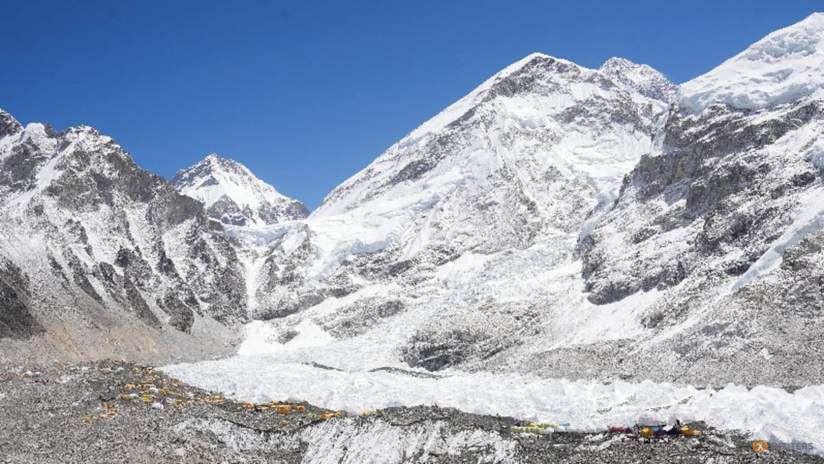 Record number of climbers scale Everest’s Nepal side in single day