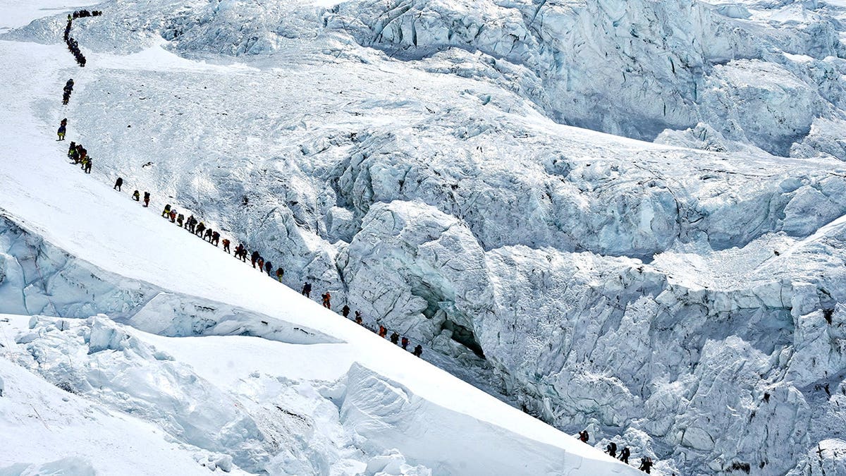 Record number of climbers summit Mount Everest from Nepali side despite overcrowding concerns