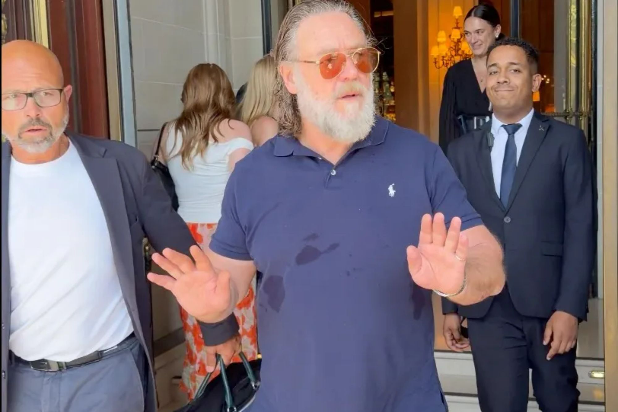 Russell Crowe warns autograph hunters gathered outside his Paris hotel: ‘Don’t f–king push in on me’