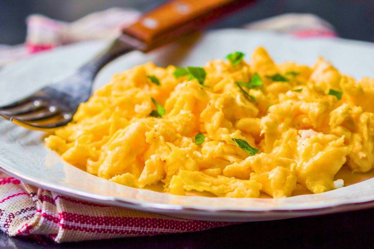 Scrambled eggs will be creamier if you swap milk for an ingredient chefs love