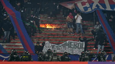 South America’s Champions League match stopped less than 2 mins in after fans started burning stadium sections | International Sports News – The Times of India