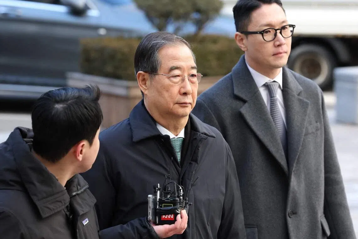 South Korea appeals court cuts jail term for ex-PM Han to 15 years in martial law case