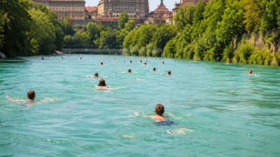 Switzerland’s summer hack: People swim through a river to get home from work | World News – The Times of India