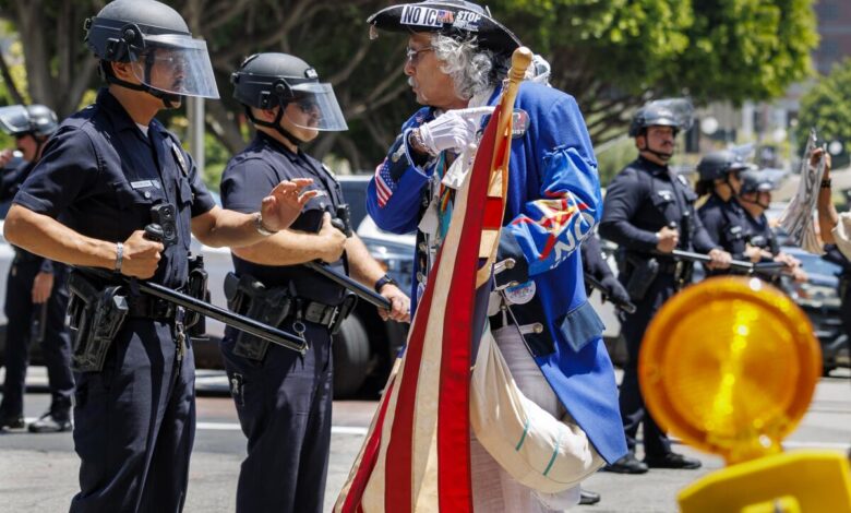 Thousands rally in L.A. for May Day to protest immigration sweeps, high cost of living