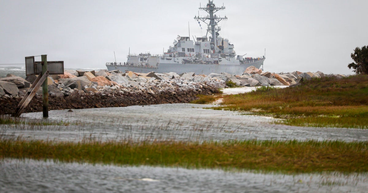 U.S. strikes 2 Iranian ports as American warships come under fire