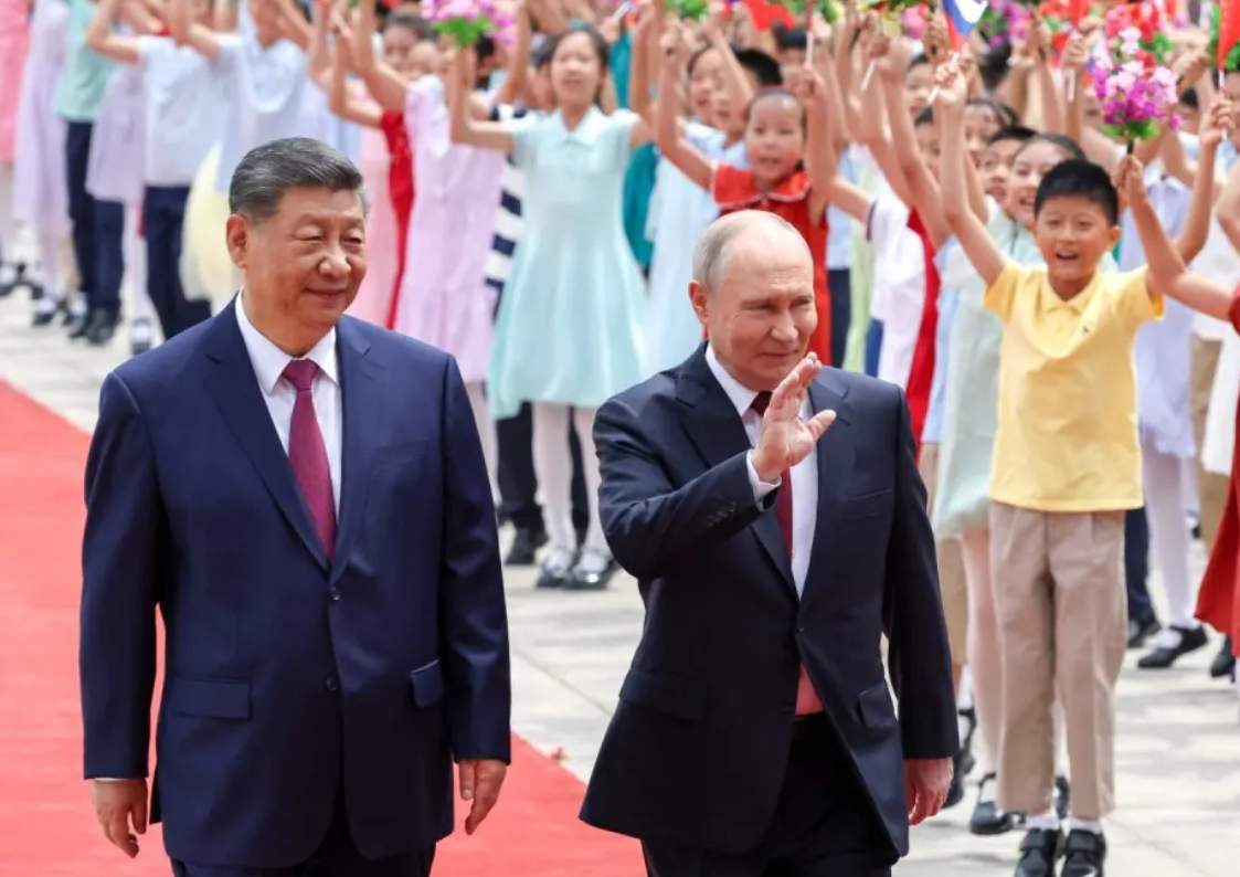 Xi Hosts Putin With Grand Ceremony Amid Subtle US Messaging